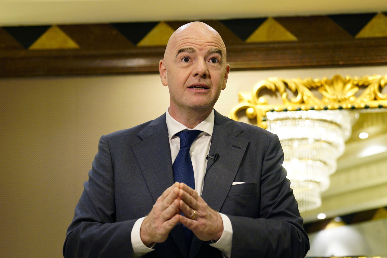 FILE - FIFA President Gianni Infantino speaks during an interview conducted with The Associated Pre...