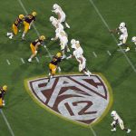 
              FILE - The Pac-12 logo is shown during the second half of an NCAA college football game between Arizona State and Kent State, in Tempe, Ariz. on Aug. 29, 2019. The Pac-12 announced, Wednesday, May 18, 2022, it was scrapping its divisional format for the coming season Wednesday, May 18, 2022. (AP Photo/Ralph Freso, File)
            