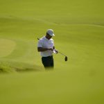 
              Tiger Woods plays the second hole during a practice round for the PGA Championship golf tournament, Wednesday, May 18, 2022, in Tulsa, Okla. (AP Photo/Matt York)
            