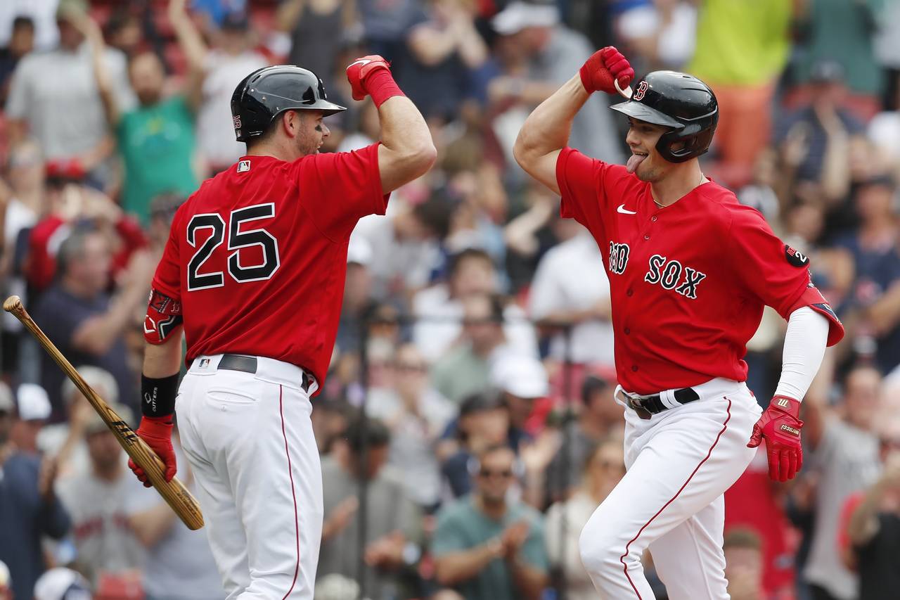 Boston Red Sox's Bobby Dalbec celebrates his solo home run with Kevin Plawecki (25) during the sixt...