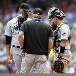 
              Miami Marlins pitching coach Mel Stottlemyre, center, visits the mound and speaks with pitcher Tommy Nance, left, and catcher Nick Fortes in the fifth inning of a baseball game, Sunday, May 29, 2022, in Atlanta. (AP Photo/Hakim Wright Sr.)
            