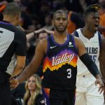 
              Phoenix Suns guard Chris Paul (3) and Dallas Mavericks forward Reggie Bullock, right, react after Paul was called for a foul during the first half of Game 2 of an NBA basketball second round playoff series, Wednesday, May 4, 2022, in Phoenix. (AP Photo/Matt York)
            