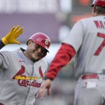 
              St. Louis Cardinals' Yadier Molina, left, is congratulated by third base coach Ron Warner (75) as he rounds the bases after hitting a solo home run against the San Francisco Giants during the third inning of a baseball game Thursday, May 5, 2022, in San Francisco. (AP Photo/Tony Avelar)
            