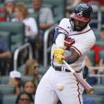 
              Atlanta Braves' Michael Harris II, making his major-league debut, hits his first major league hit in the sixth inning, a single, and proceeded to score the Braves' only run of a baseball game against the Miami Marlins, Saturday, May 28, 2022, in Atlanta. (AP Photo/Bob Andres)
            