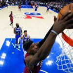 
              Miami Heat's Jimmy Butler dunks against the Philadelphia 76ers during the second half of Game 6 of an NBA basketball second-round playoff series, Thursday, May 12, 2022, in Philadelphia. (AP Photo/Matt Slocum)
            
