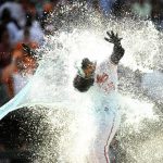
              Baltimore Orioles' Anthony Santander is doused as he celebrates heading home after hitting a three-run walk off home run during the ninth inning of a baseball game against the New York Yankees, Thursday, May 19, 2022, in Baltimore. The Orioles won 9-6. (AP Photo/Nick Wass)
            