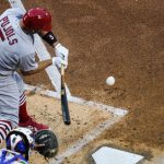 
              St. Louis Cardinals' Albert Pujols hits an RBI single during the second inning of the team's baseball game against the New York Mets on Wednesday, May 18, 2022, in New York. (AP Photo/Frank Franklin II)
            
