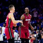 
              Miami Heat's Tyler Herro, left, and Miami Heat's Bam Adebayo celebrate during the second half of Game 6 of an NBA basketball second-round playoff series against the Philadelphia 76ers, Thursday, May 12, 2022, in Philadelphia. (AP Photo/Matt Slocum)
            