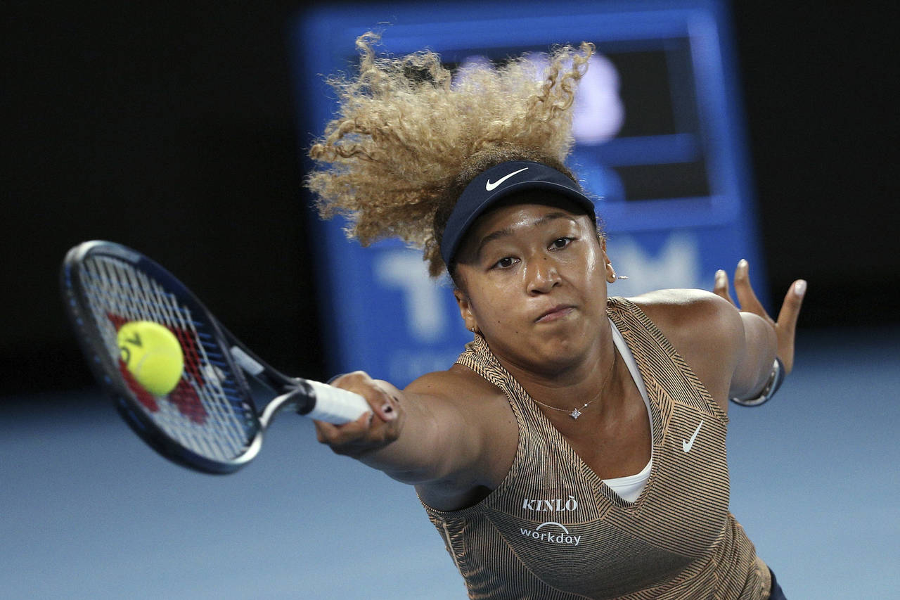 FILE - Naomi Osaka of Japan plays a forehand during their singles match against Andrea Petkovic of ...