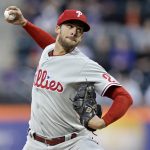 
              Philadelphia Phillies pitcher Aaron Nola throws during the first inning of the team's baseball game against the New York Mets on Friday, April 29, 2022, in New York. (AP Photo/Adam Hunger)
            