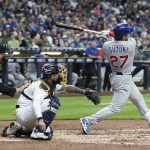 
              Chicago Cubs' Seiya Suzuki hits an RBI double during the sixth inning of a baseball game against the Milwaukee Brewers Sunday, May 1, 2022, in Milwaukee. (AP Photo/Morry Gash)
            