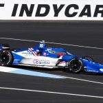
              Alex Palou, of Spain, heads into the first turn during practice for the IndyCar auto race at Indianapolis Motor Speedway in Indianapolis, Friday, May 13, 2022. (AP Photo/Michael Conroy)
            