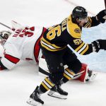 
              Boston Bruins' Erik Haula (56) celebrates his goal on Carolina Hurricanes goalie Antti Raanta (32) during the third period in Game 6 of an NHL hockey Stanley Cup first-round playoff series Thursday, May 12, 2022, in Boston. (AP Photo/Michael Dwyer)
            