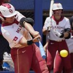
              Oklahoma's Jocelyn Alo singles in the second inning of an NCAA softball game against Iowa State in the Big 12 tournament Friday, May 13, 2022, in Oklahoma City. (AP Photo/Sue Ogrocki)
            