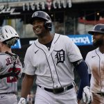 
              Detroit Tigers designated hitter Jonathan Schoop walks to the dugout after scoring on a two-run home run during the first inning of the second baseball game of a doubleheader against the Minnesota Twins, Tuesday, May 31, 2022, in Detroit. (AP Photo/Carlos Osorio)
            