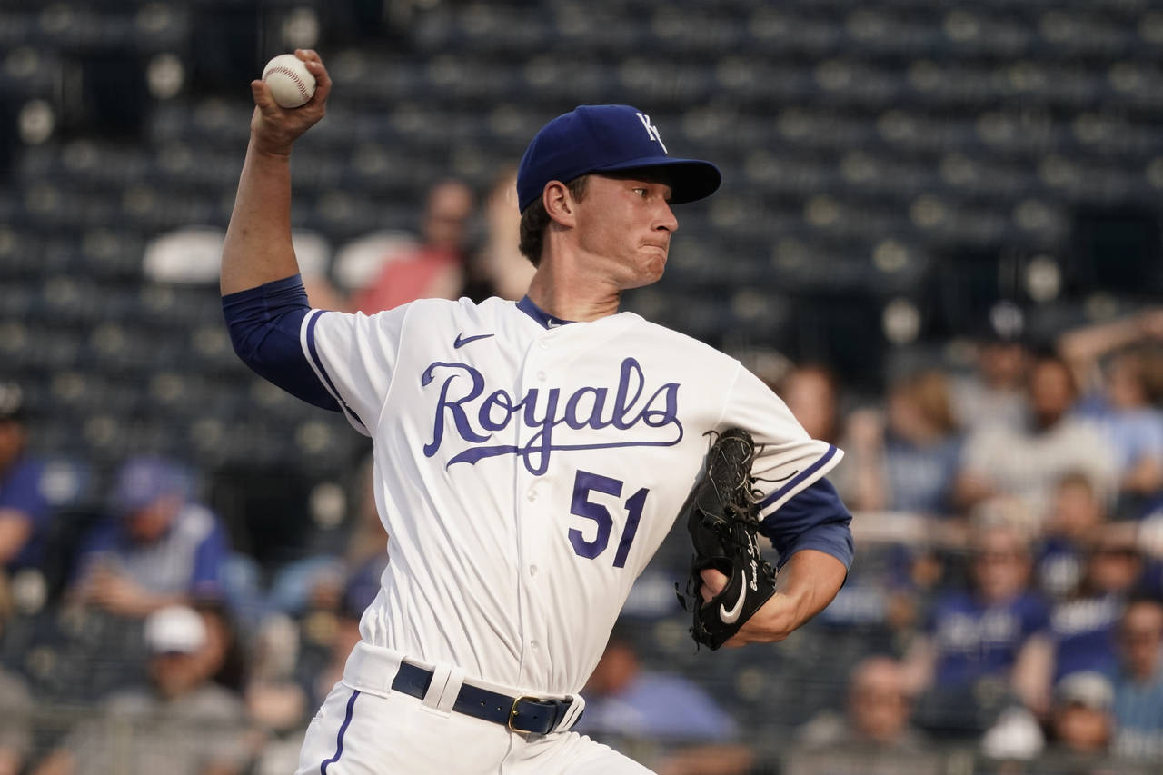 Kansas City Royals starting pitcher Brady Singer throws during the first inning in the second game ...