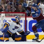 
              Colorado Avalanche left wing Gabriel Landeskog (92) celebrates a goal against St. Louis Blues goaltender Jordan Binnington (50) during the third period in Game 2 of an NHL hockey Stanley Cup second-round playoff series Thursday, May 19, 2022, in Denver. (AP Photo/Jack Dempsey)
            
