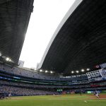 
              The roof is opened at the Rogers Centre following a storm that passed over the city during the fourth inning of a baseball game between the Toronto Blue Jays and the Cincinnati Reds in Toronto, Saturday, May 21, 2022.  (Frank Gunn/The Canadian Press via AP)
            