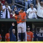 
              Houston Astros' Jose Altuve, front, celebrates his home run with Jose Siri, back, during the ninth inning of a baseball game against the Washington Nationals, Sunday, May 15, 2022, in Washington. (AP Photo/Nick Wass)
            