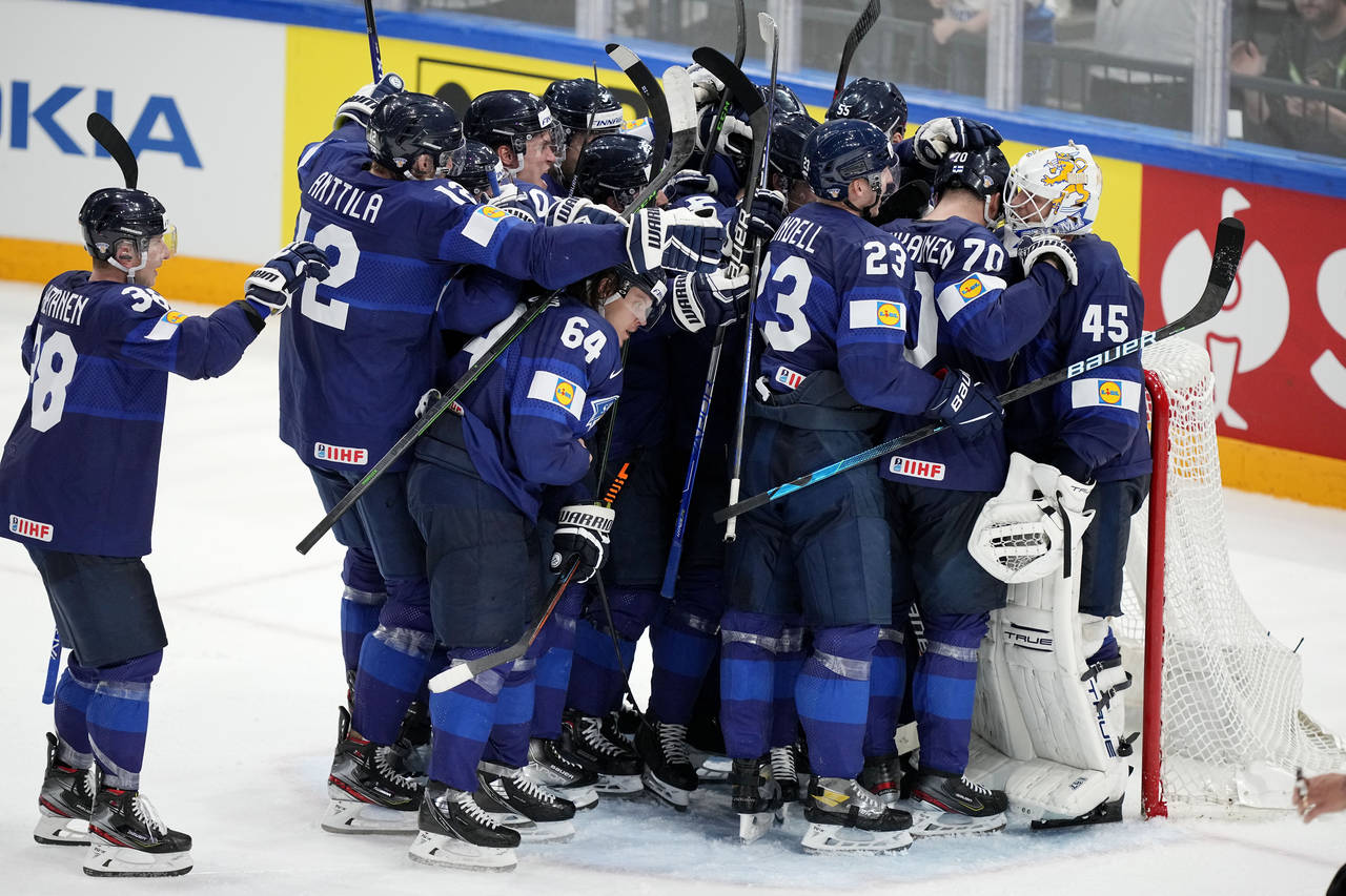 Team Finland celebrates victory after a match between Finland and the the United States in the semi...