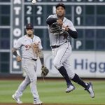 
              Detroit Tigers second baseman Jonathan Schoop, right, throws out Houston Astros' Jeremy Pena on a ground ball in the bottom of the sixth inning Friday, May 6, 2022, in Houston. (Kevin M. Cox/The Galveston County Daily News via AP)
            