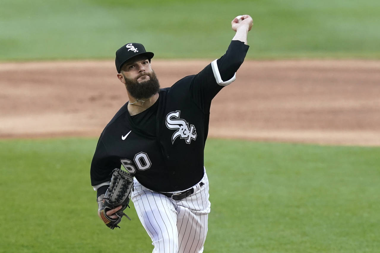 Chicago White Sox starting pitcher Dallas Keuchel delivers during the first inning of the team's ba...