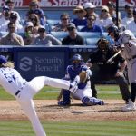 
              Detroit Tigers' Miguel Cabrera, right, hits a two-run home run as Los Angeles Dodgers relief pitcher Phil Bickford, left, watches along with catcher Will Smith and home plate umpire Brian Knight during the eighth inning of a baseball game Sunday, May 1, 2022, in Los Angeles. (AP Photo/Mark J. Terrill)
            