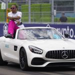 
              Mercedes driver Lewis Hamilton of Britain rides in the driver parade ahead of the Formula One Miami Grand Prix auto race at the Miami International Autodrome, Sunday, May 8, 2022, in Miami Gardens, Fla. (AP Photo/Darron Cummings)
            