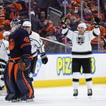 
              Los Angeles Kings defenseman Troy Stecher, right, celebrates as Edmonton Oilers goalie Mike Smith skates to the bench during overtime in Game 5 of an NHL hockey Stanley Cup first-round playoff series, Tuesday, May 10, 2022 in Edmonton, Alberta. (Jeff McIntosh/The Canadian Press via AP)
            