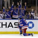 
              New York Rangers' Mika Zibanejad reacts after scoring a goal against the Carolina Hurricanes in the first period of Game 3 of an NHL hockey Stanley Cup second-round playoff series, Sunday, May 22, 2022, in New York. (AP Photo/Adam Hunger)
            