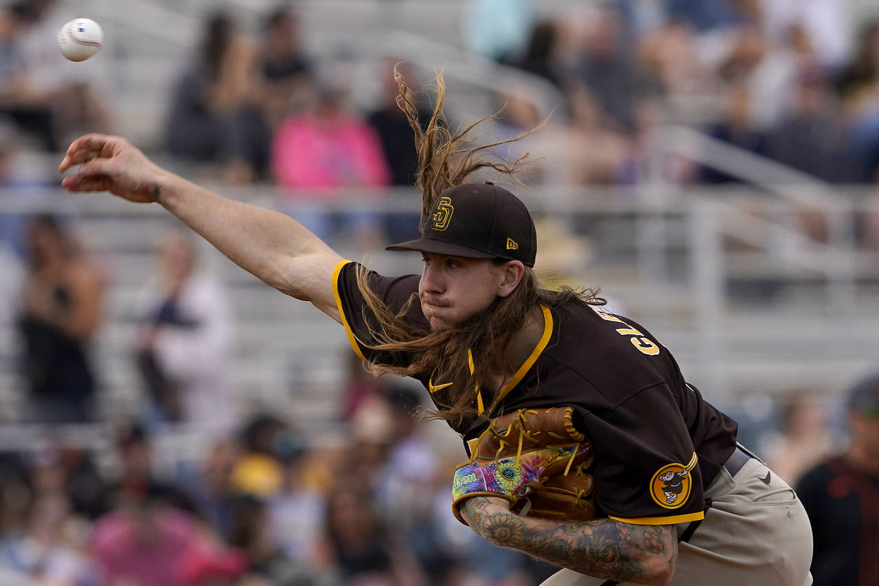 San Diego Padres starting pitcher Mike Clevinger throws against the San Francisco Giants during the...