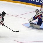
              Morgan Geekie of Canada scores his side's 5th goal during the group A Hockey World Championship match between Slovakia and Canada in Helsinki, Finland, Monday May 16, 2022. (AP Photo/Martin Meissner)
            