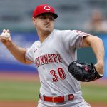 
              Cincinnati Reds starting pitcher Tyler Mahle throws against the Cleveland Guardians during the first inning of a baseball game, Thursday, May 19, 2022, in Cleveland. (AP Photo/Ron Schwane)
            