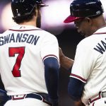 
              Atlanta Braves third base coach Ron Washington (37) speaks with Dansby Swanson (7) during the third inning of the team's baseball game against the Philadelphia Phillies on Thursday, May 26, 2022, in Atlanta. (AP Photo/Hakim Wright Sr.)
            