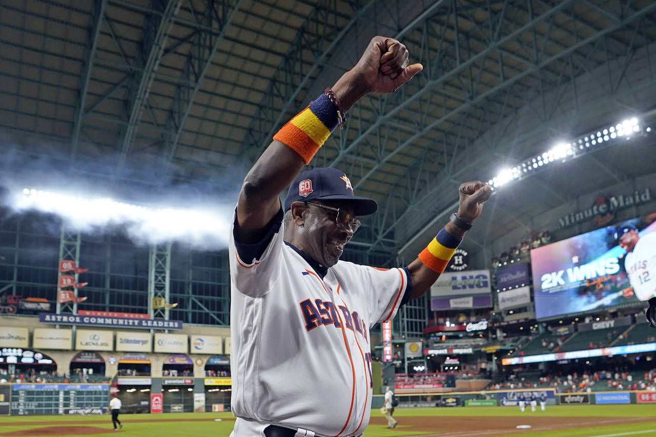 Houston Astros' Dusty Baker Jr. (12) celebrates after a baseball game against the Seattle Mariners ...
