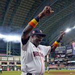 
              Houston Astros' Dusty Baker Jr. (12) celebrates after a baseball game against the Seattle Mariners Tuesday, May 3, 2022, in Houston. The Astros won 4-0 giving Baker 2,000 career wins. (AP Photo/David J. Phillip)
            