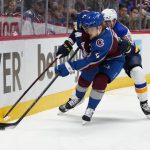
              Colorado Avalanche defenseman Bowen Byram (4) is pressured by St. Louis Blues right wing Alexei Toropchenko (65) during the first period in Game 2 of an NHL hockey Stanley Cup second-round playoff series Thursday, May 19, 2022, in Denver. (AP Photo/Jack Dempsey)
            