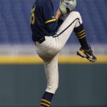 
              Michigan starting pitcher Walker Cleveland prepares to throw against Rutgers in the first inning of the NCAA college Big Ten baseball championship game Sunday, May 29, 2022, at Charles Schwalb Field in Omaha, Neb. (AP Photo/Rebecca S. Gratz)
            