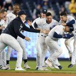 
              New York Yankees' Jose Trevino, second from right, celebrates with teammates after hitting an RBI single during the 11th inning of the team's baseball game against the Baltimore Orioles on Tuesday, May 24, 2022, in New York. (AP Photo/Frank Franklin II)
            