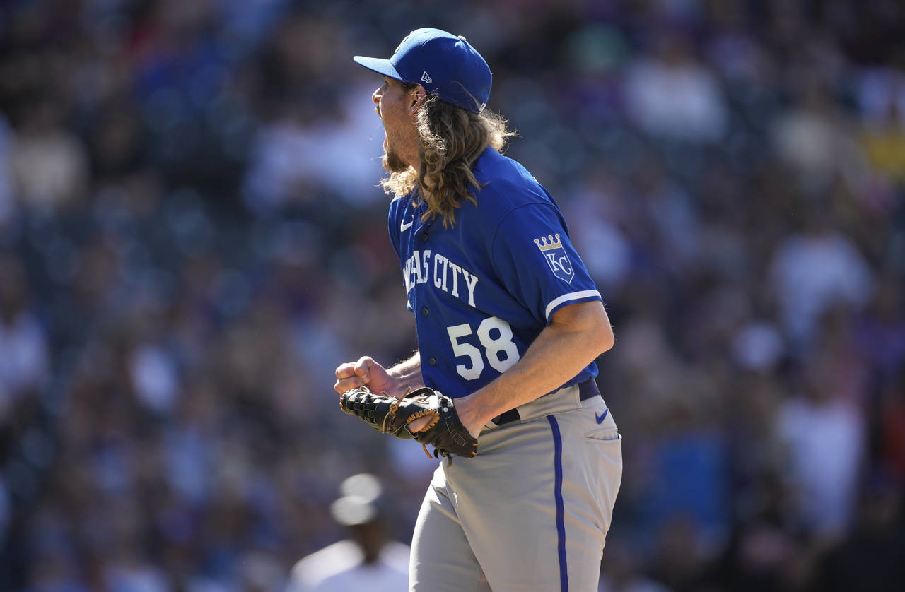 Kansas City Royals relief pitcher Scott Barlow reacts after striking out Colorado Rockies' Randal G...