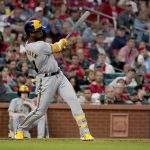 
              Milwaukee Brewers' Andrew McCutchen follows through on an RBI single during the fourth inning of a baseball game against the St. Louis Cardinals Thursday, May 26, 2022, in St. Louis. (AP Photo/Jeff Roberson)
            