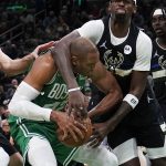 
              Milwaukee Bucks center Bobby Portis, right, fouls Boston Celtics center Al Horford (42) during the second half of Game 2 of an Eastern Conference semifinal in the NBA basketball playoffs Tuesday, May 3, 2022, in Boston. (AP Photo/Charles Krupa)
            