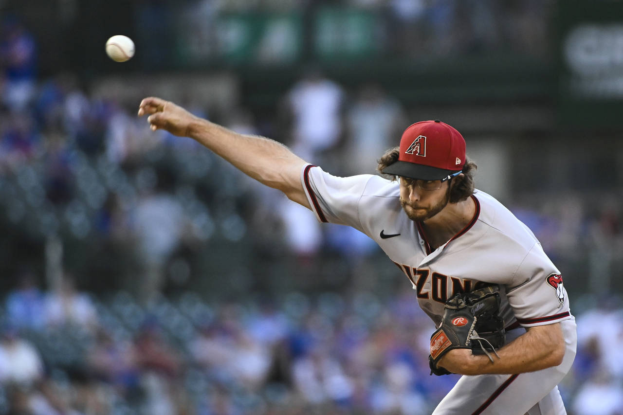 Arizona Diamondbacks starting pitcher Zac Gallen throws to a Chicago Cubs batter during the first i...