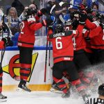 
              Team Canada celebrates a overtime goal made by Drake Batherson during the Hockey World Championship quarterfinal match between Sweden and Canada in Tampere, Finland, Thursday, May 26, 2022. (Vesa Moilanen/Lehtikuva via AP)
            