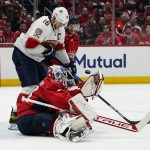 
              Washington Capitals goaltender Ilya Samsonov (30) tries to grab the puck with Florida Panthers center Aleksander Barkov (16) nearby during the second period of Game 4 in the first round of the NHL Stanley Cup hockey playoffs, Monday, May 9, 2022, in Washington. (AP Photo/Alex Brandon)
            