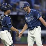 
              Tampa Bay Rays relief pitcher Colin Poche, right, celebrates with catcher Francisco Mejia after closing out the Miami Marlins during a baseball game Wednesday, May 25, 2022, in St. Petersburg, Fla. (AP Photo/Chris O'Meara)
            