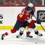 
              Florida Panthers center Sam Reinhart (13) vies for the puck against Washington Capitals left wing Conor Sheary (73) during the first period of Game 1 of an NHL hockey first-round playoff series Tuesday, May 3, 2022, in Sunrise, Fla. (AP Photo/Reinhold Matay)
            