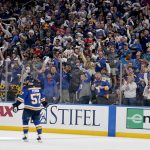 
              Fans cheer after a goal by St. Louis Blues' David Perron (57) during the first period in Game 4 of an NHL hockey Stanley Cup second-round playoff series between the St. Louis Blues and the Colorado Avalanche Monday, May 23, 2022, in St. Louis. (AP Photo/Jeff Roberson)
            