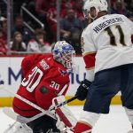 
              Washington Capitals goaltender Ilya Samsonov (30) and Florida Panthers left wing Jonathan Huberdeau (11) watch as the puck deflects off the pads of Samsonov during the second period of Game 3 in the first-round of the NHL Stanley Cup hockey playoffs, Saturday, May 7, 2022, in Washington. (AP Photo/Alex Brandon)
            