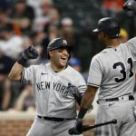 
              New York Yankees' Jose Trevino, left, celebrates his three-run home run with teammate Aaron Hicks (31) during the fourth inning of a baseball game against the Baltimore Orioles, Monday, May 16, 2022, in Baltimore. (AP Photo/Nick Wass)
            